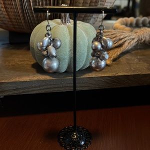 Silver tone dangle earrings